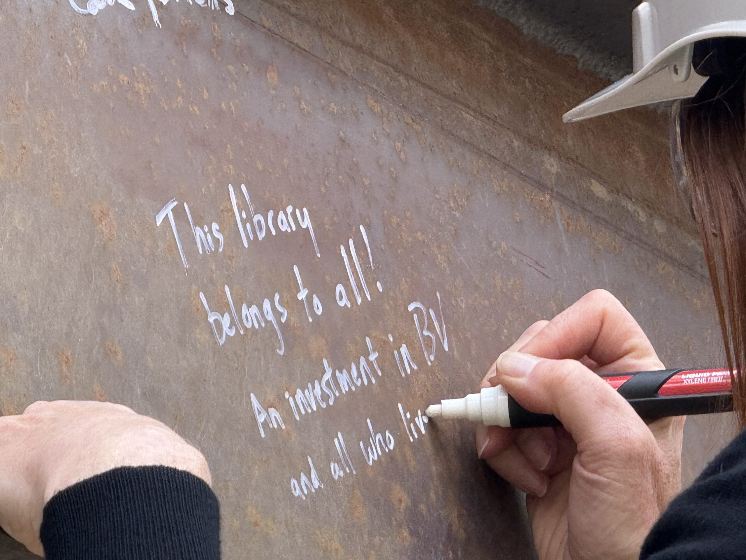 IMG_7619 A message inscribed on a steel beam: This library belongs to all!